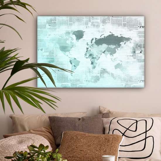 Wereldkaart aux couleurs bleu clair sur fond de papier journal 60x40 cm