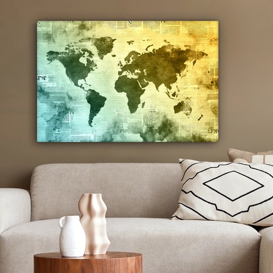 Wereldkaart avec peinture jaune qui passe au bleu sur fond avec journal 60x40 cm