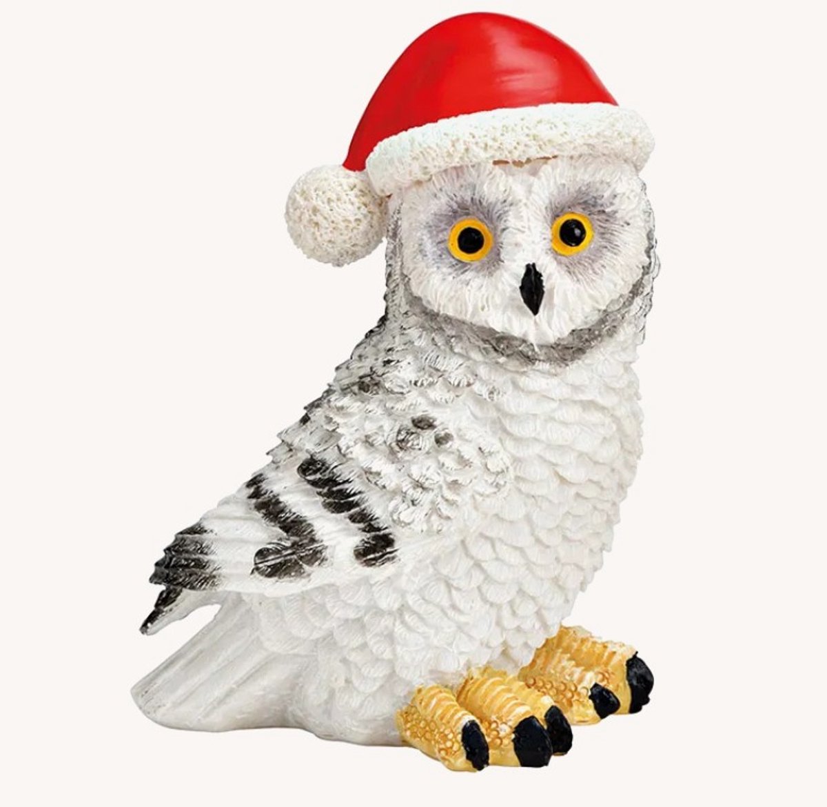 Klein beeldje witte uil met rode kerstmuts
