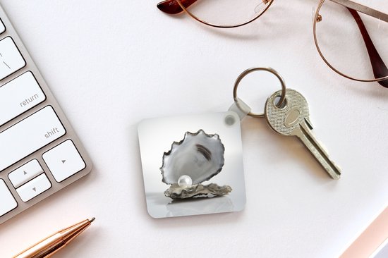 Porte-clés - Perle dans une huître - Plastique