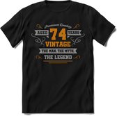 74 Jaar Legend T-Shirt | Goud - Zilver | Grappig Verjaardag Cadeau | Dames - Heren | - Zwart - L