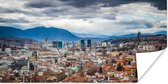 Poster Wolkendek boven Sarajevo Bosnië en Herzegovina - 80x40 cm
