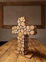 Houten kruis bekleed  met boomstamschijfjes ( In 3D )