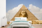Behang - Fotobehang Sfinx voor de grote piramide van Giza - Breedte 525 cm x hoogte 350 cm