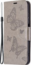 Mobigear Telefoonhoesje geschikt voor Xiaomi Redmi 10 4G Hoesje | Mobigear Butterfly Bookcase Portemonnee | Pasjeshouder voor 2 Pasjes | Telefoonhoesje voor Pinpas / OV Kaart / Rijbewijs - Grijs