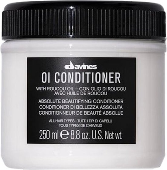 Pot de revitalisant Davines OI avec couvercle noir, contient 250 ml.