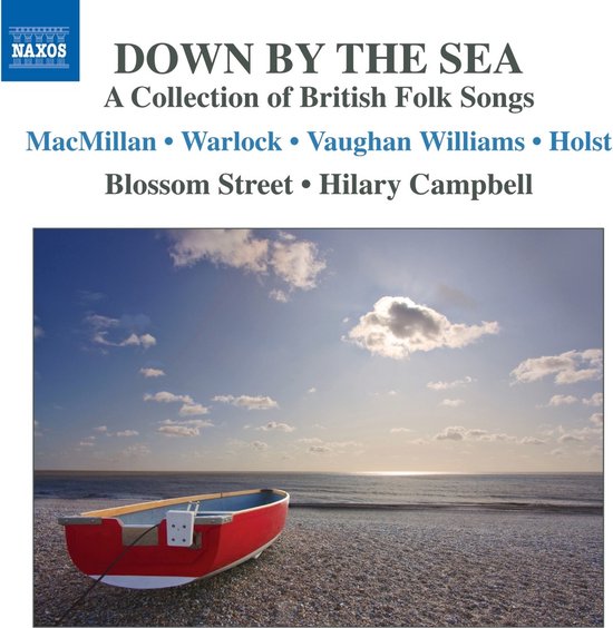 Rode roeiboot op een kiezelstrand met de zee en lucht op de achtergrond. Het album 'Down By The Sea' staat erop.