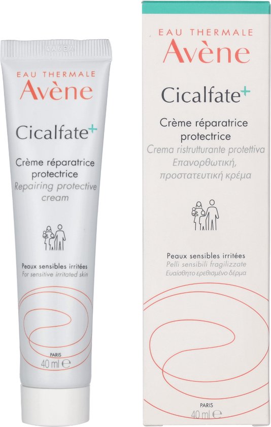 Witte tube en kartonnen doosje met rode tekst "Avène Cicalfate+". "Crème réparatrice protectrice". "Peaux sensibles irritées".