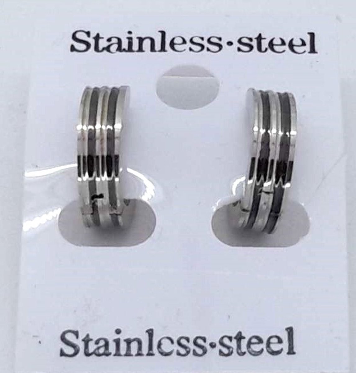 Chirurgsch staal ooroorringen met zilver en zwart dunne streep.