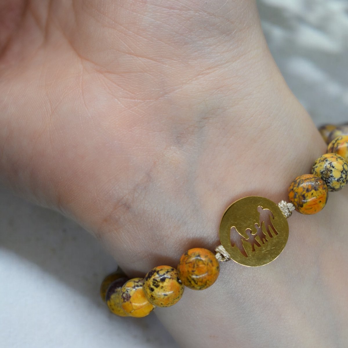 Mooie Armband Met Gouden Familie Bedel
