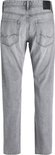 Achterkant van een grijze jeans, staand met zwarte achtergrond.