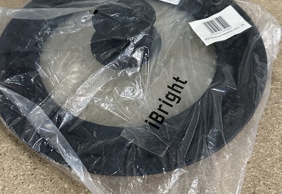 Glazen iBright deksel met zwarte siliconen rand, in plastic verpakking.
