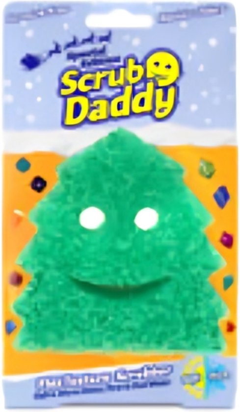 Groene kerstboomvormige Scrub Daddy schuurspons met gezicht, in blauwe verpakking met sneeuw.