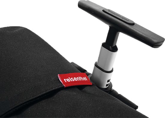 Detail van de uittrekbare handgreep en rode 'reisenthel' label op de zwarte boodschappentrolley.