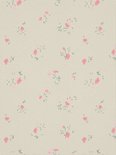 Beige stof met een herhalend patroon van kleine roze bloemetjes en groene takjes.
