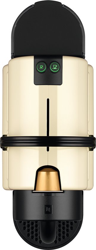 Vue de dessus d'une machine à café à capsules Nespresso Inissia crème avec une capsule.