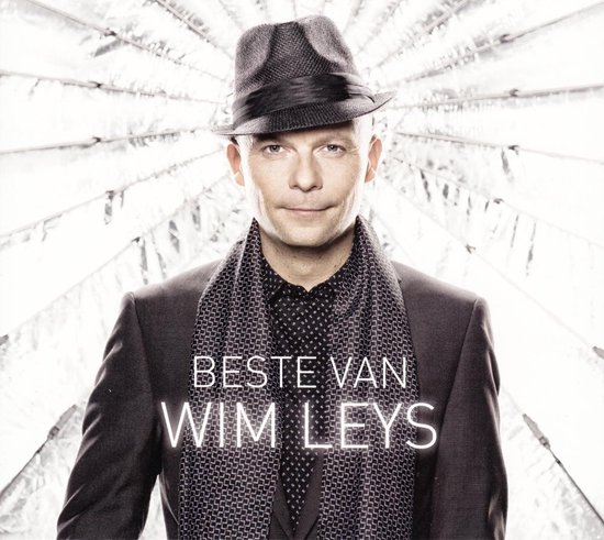 Man met fedora hoed, sjaal en pak. "Beste Van Wim Leys" is op de borst geschreven.