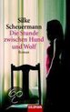 Die Stunde zwischen Hund und Wolf: Roman | Silke Scheu... | Book