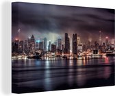 Canvas Schilderij De skyline van New York in de nacht - 120x80 cm - Wanddecoratie