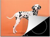KitchenYeah® Inductie beschermer 71x52 cm - Hond - Dalmatiër - Oranje - Kookplaataccessoires - Afdekplaat voor kookplaat - Inductiebeschermer - Inductiemat - Inductieplaat mat