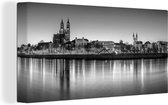 Canvas Schilderij Panorama van de Duitse stad Maagdenburg - zwart wit - 40x20 cm - Wanddecoratie