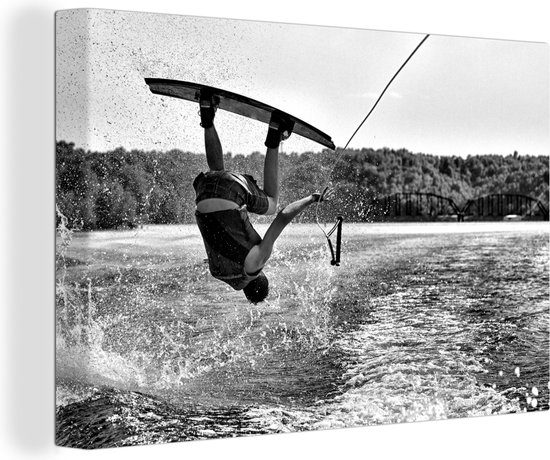 Foto: Canvas schilderij 140x90 cm wanddecoratie een mannelijke tiener hangt ondersteboven op een wakeboard zwart wit muurdecoratie woonkamer slaapkamer decoratie kamer accessoires schilderijen