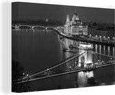 Canvas Schilderij Boedapest kettingbrug bij nacht - zwart wit - 120x80 cm - Wanddecoratie