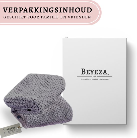 Grijze haarhanddoek met een label en een gesloten witte doos met het BEYEZA logo.