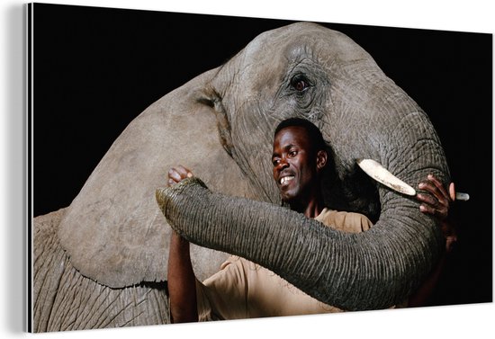 Décoration murale Métal - Peinture Aluminium Industrielle - Portrait d'un homme et d'un éléphant sur fond noir - 40x20 cm - Dibond - Photo sur aluminium - Décoration murale industrielle - Pour le salon / chambre