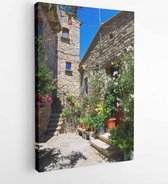 Canvas schilderij - Winding narrow stone streets in Eze near Nice, France. Beautiful bougainvillea -  206586193 - 40-30 Vertical