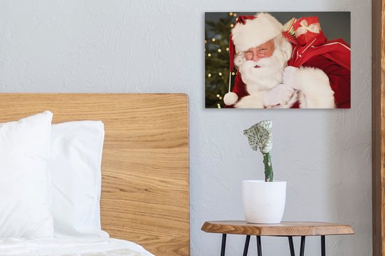 Un portrait du Père Noël portant un sac rouge sur son épaule toile 30x20 cm - petit - Tirage photo sur toile (Décoration murale salon / chambre)