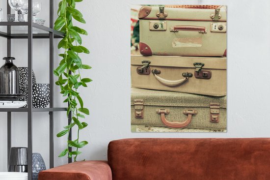 Tableaux sur toile Rétro femme avec la valise à la gare