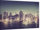 De nachtelijke skyline van Manhattan in New York City - Foto op Canvas - 45 x 30 cm