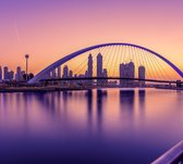 Zonsopkomst zorgt voor een paarse gloed in Dubai - Fotobehang (in banen) - 450 x 260 cm