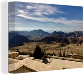 Canvas Schilderij Uitzicht over het land van de oude stad Petra - 120x90 cm - Wanddecoratie