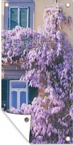 Wanddecoratie buiten Blauwe regen vol met bloemen - 80x160 cm - Tuindoek - Buitenposter