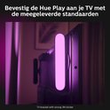 Barre lumineuse rose fixée à l'arrière d'un téléviseur avec un autocollant 3M résistant.