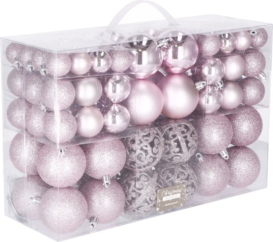 Een transparante doos vol met roze kerstballen in diverse soorten en maten.