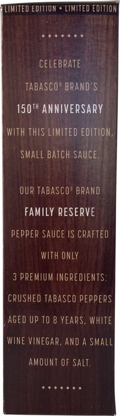 Houten doos met tekst over Tabasco's 150e jubileum, Family Reserve, drie ingrediënten, witte wijnazijn, rode peper en zout.