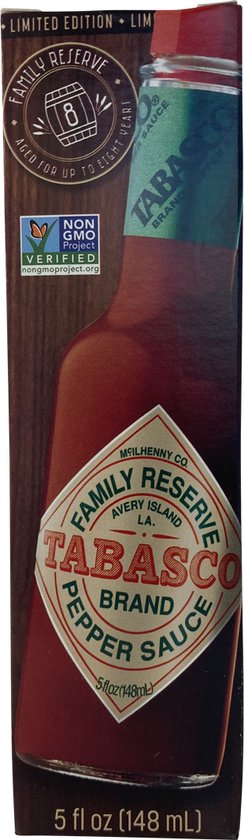 Houten doos met Tabasco Family Reserve fles, groen label en logo "Aged for up to 8 years".