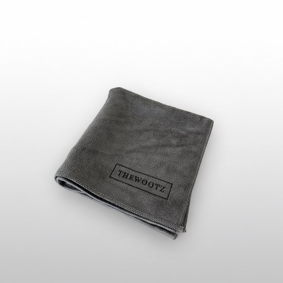 Grijs microvezeldoek met 'THEWOOTZ' logo.