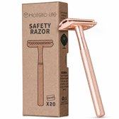 Roze veiligheidsscheermes met geribbeld handvat, naast een kartonnen verpakking met een tekening van een scheermes en de tekst 'SAFETY RAZOR'.