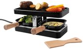 Zwarte Boska gourmetset voor 2 personen met houten spatel, grillplaat en twee pannetjes met houten handvatten.