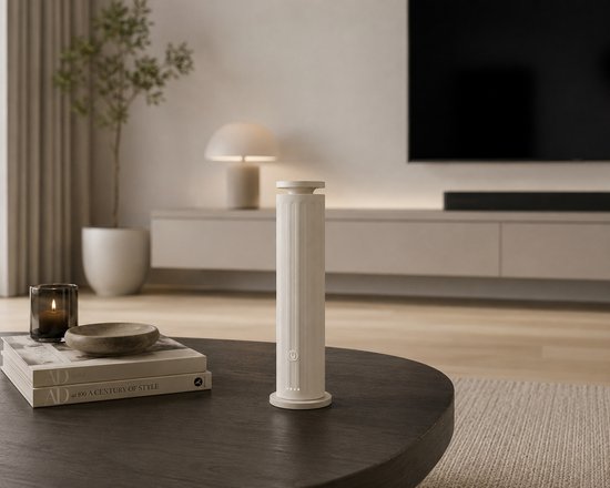 Beige staande diffuser op een salontafel in een modern interieur.