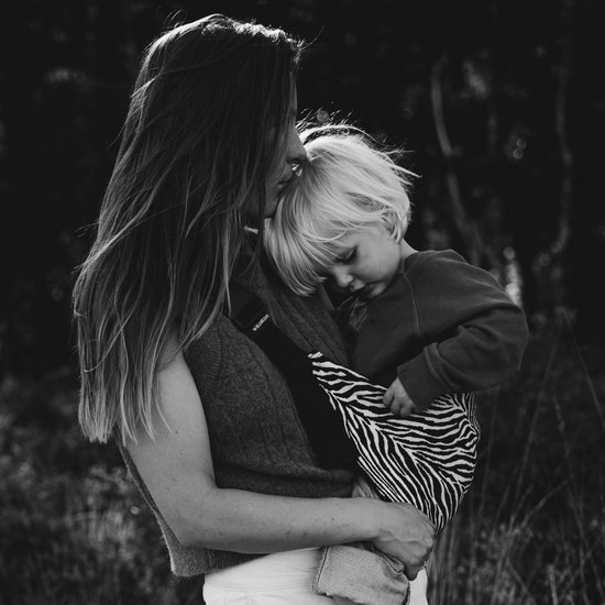 Wildride® Kinderdrager Zebraprint Zwart - Lichtgewicht & Draagbaar - Heupdrager Voor Kinderen van 9 Maanden tot 4 Jaar - Draagzak voor Baby en Peuter - Baby Carrier - Tot 20 kg