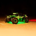 Groene 'Acid Runner' RC auto 's nachts met led-verlichting en rode en groene lichteffecten.
