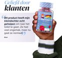 Hand houdt flesje "KIDS TUMMY GUMMIES". Tekstblok met een klantrecensie.