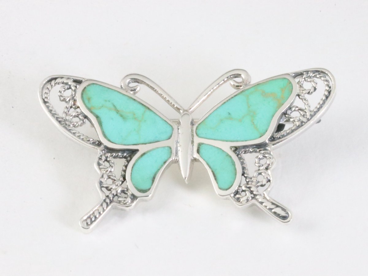 Zilveren vlinder broche met groene turkoois