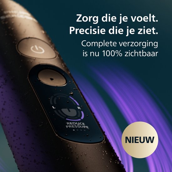 Close-up van het display van een zwarte tandenborstel met de tekst 'REDUCE PRESSURE'.