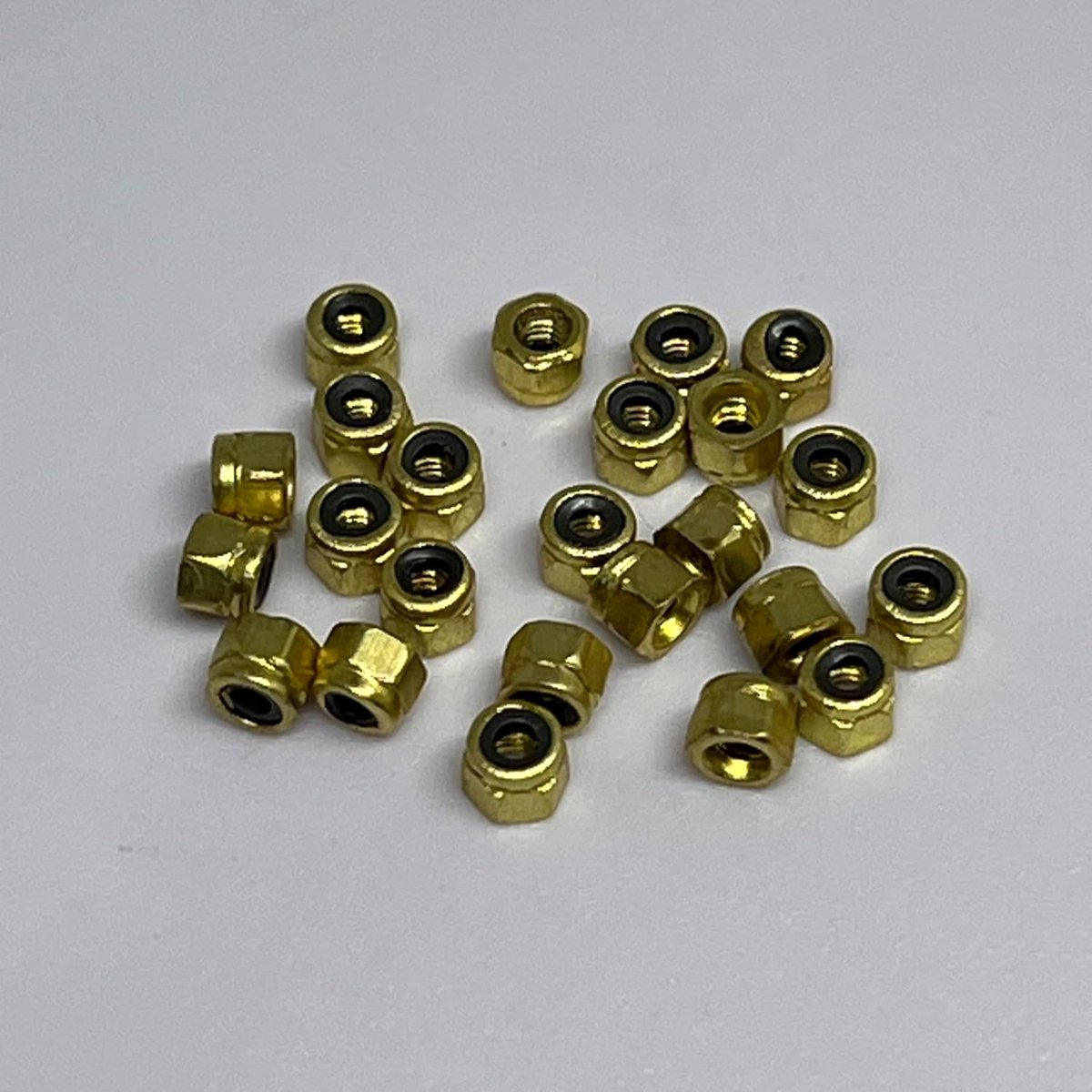 24 stuks leefai zelfvergrendelmoeren voor pro vingerboard trucks (assen) nylon inzetstukken - goudkleur